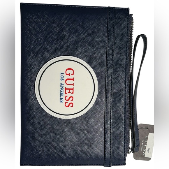 Guess Handbags - GUESS Los Angeles Navy Blue faux leather wristlet wallet.